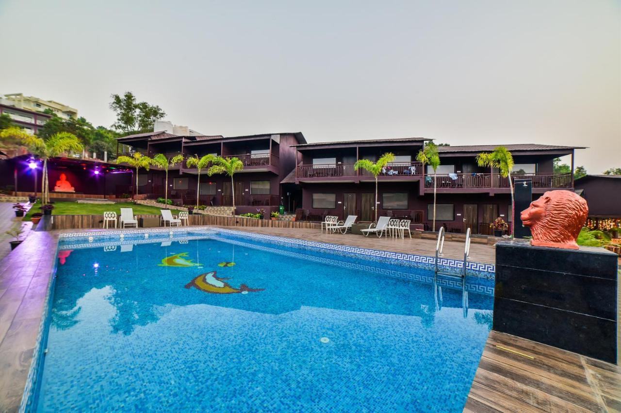 Capital O 18910 La Gracia Resort Morjim Exterior foto